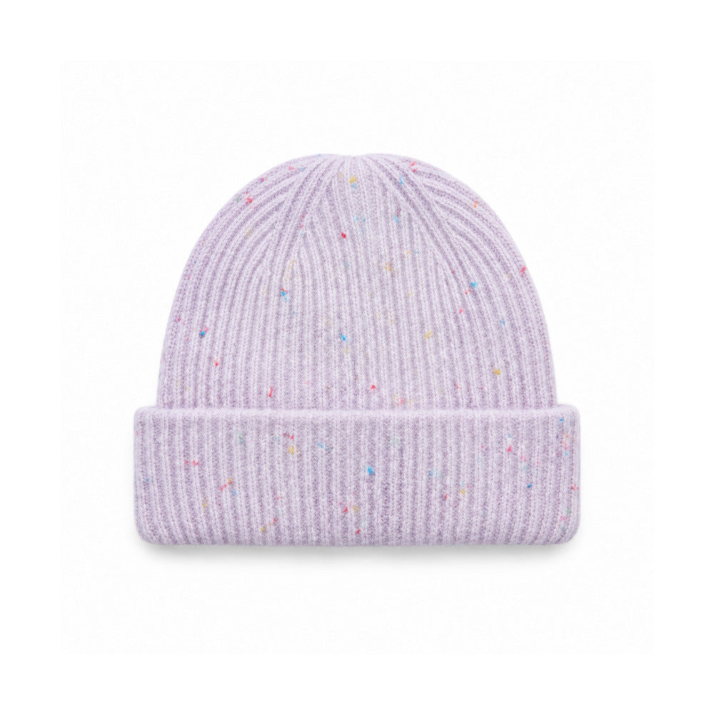 Purple speckled rib-knit beanie with a wide folded cuff, front view.