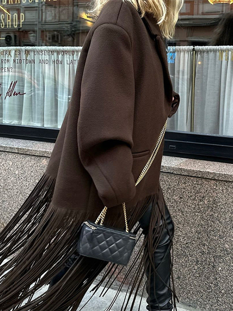 Dark brown longline duster coat with lapel collar and hanging tassel fringe