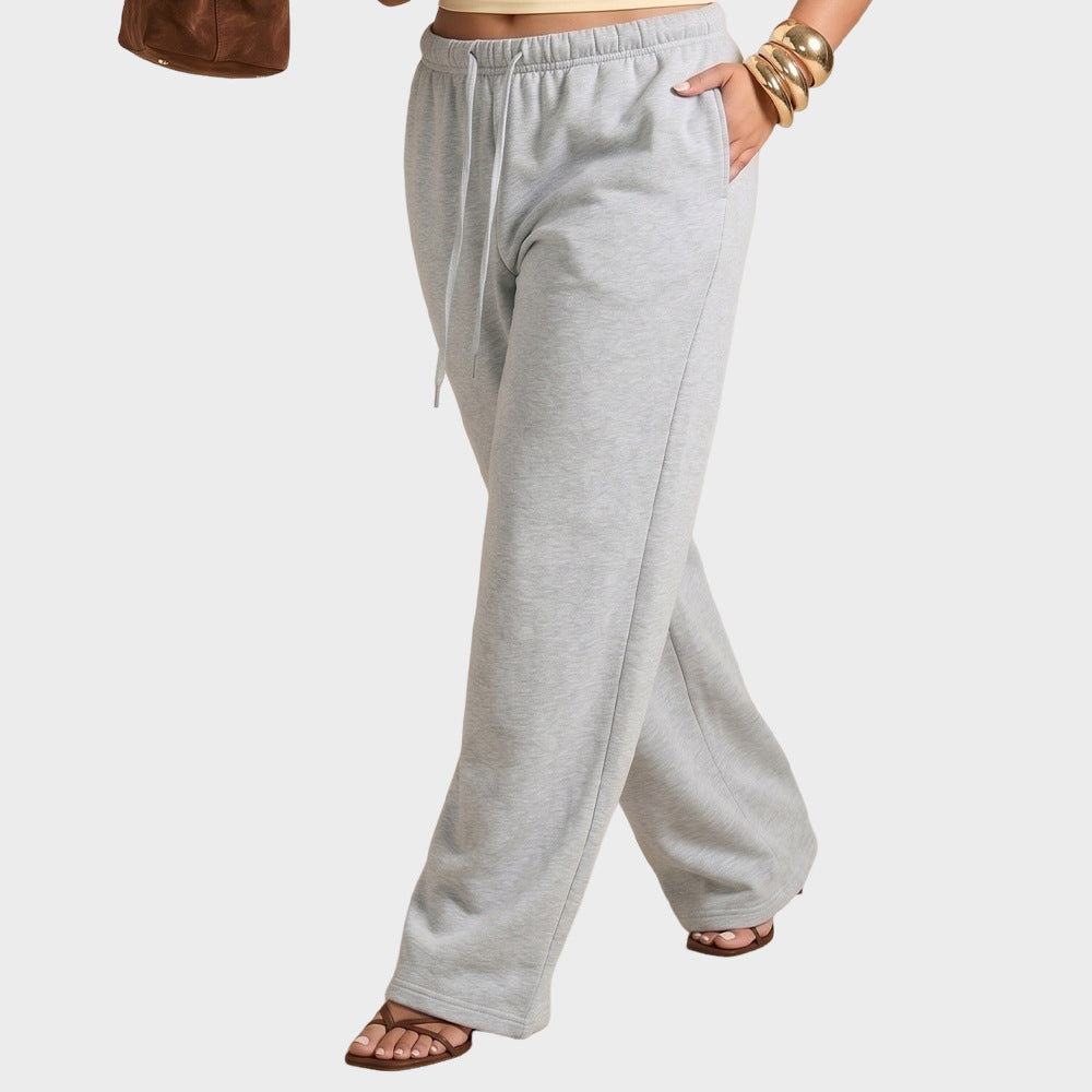 Grey high-waisted wide-leg sweatpants, drawstring waistband and flowing straight legs