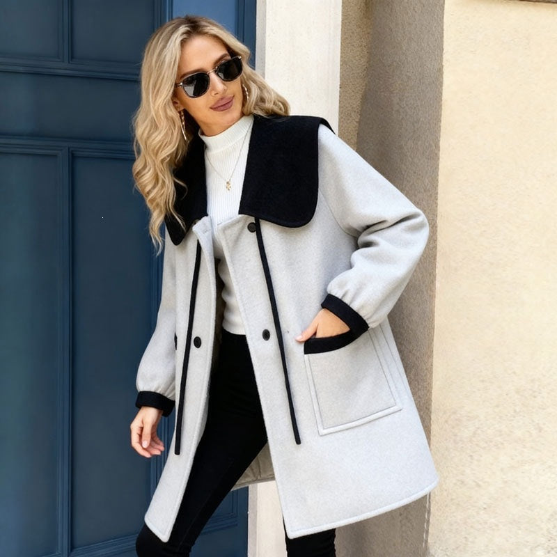Women’s color-block wool coat with shawl collar, light gray/off-white with black buttons and trim