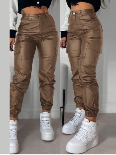 Brown faux-leather slim-fit biker pants with zipper and pleated patch pockets