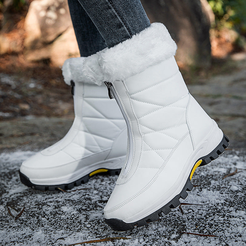 White winter snow boots with quilted uppers, faux-fur cuff, rugged tread sole
