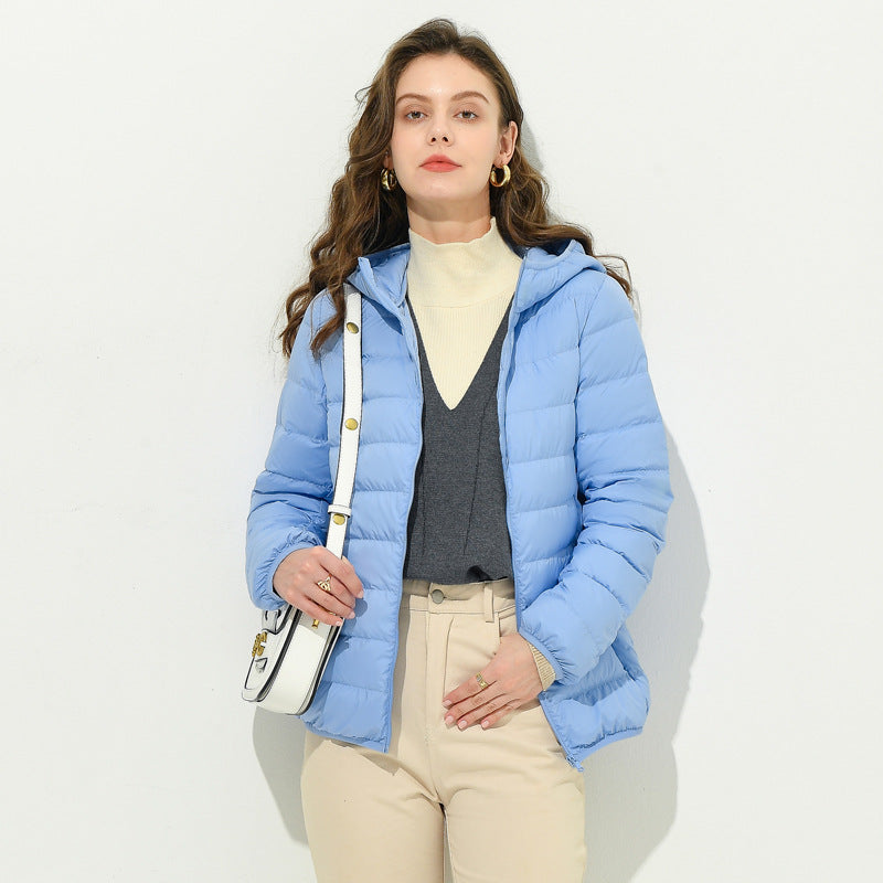 Women's lightweight down jacket, light blue, full-zip with stand collar and pockets