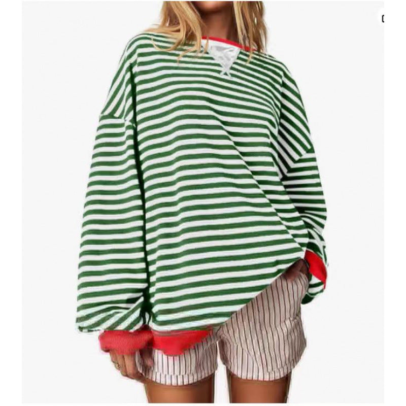Women’s striped pullover sweatshirt with long sleeves and round neckline, green and white.