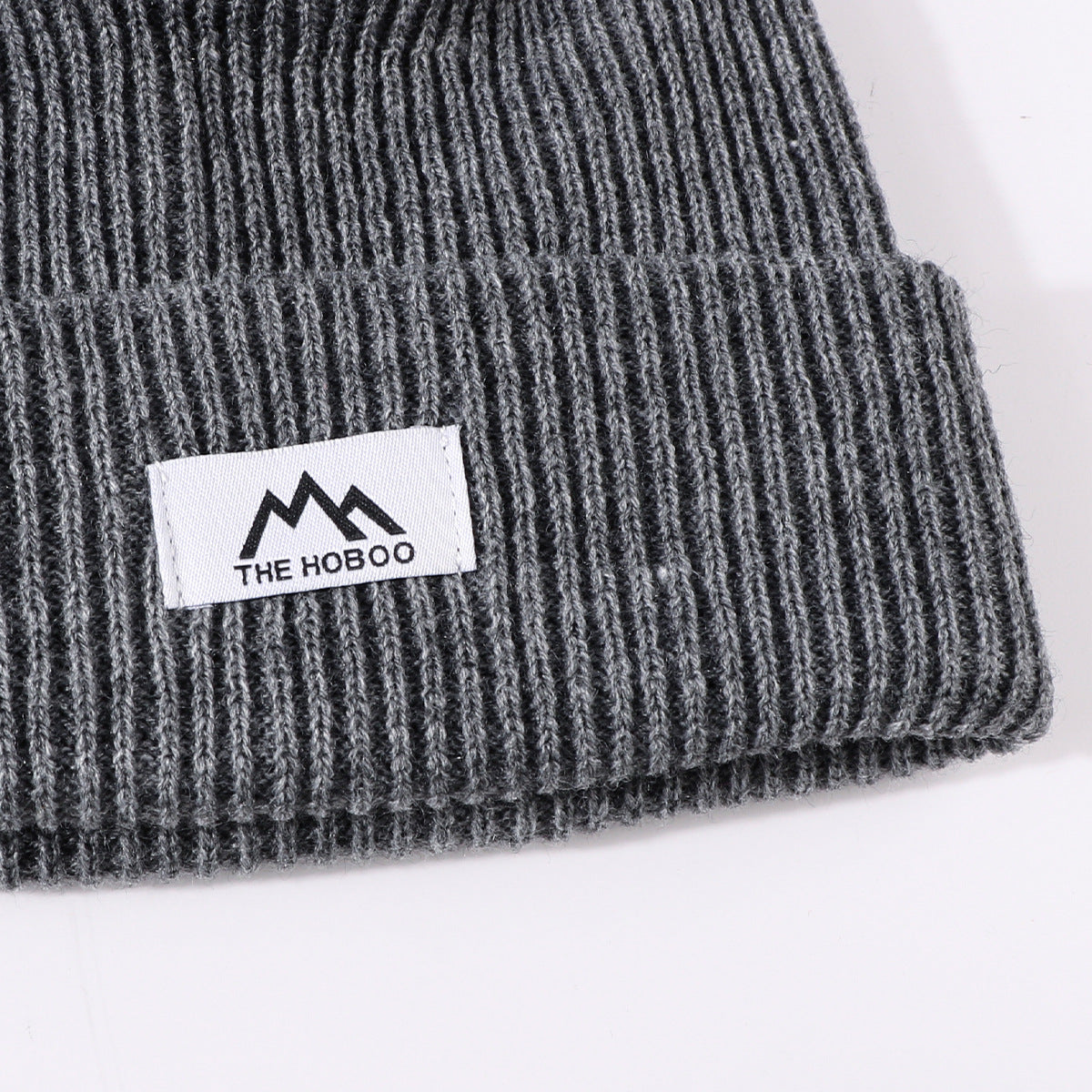 Heather gray ribbed knit beanie with fold-up cuff and THE HOBOO logo patch