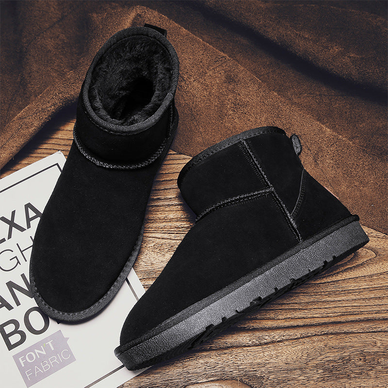 Black winter ankle boots with plush interior lining and textured outsole