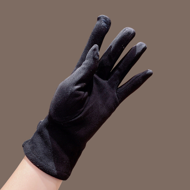 Women’s suede winter gloves, dark color, five-finger design with soft, padded texture.