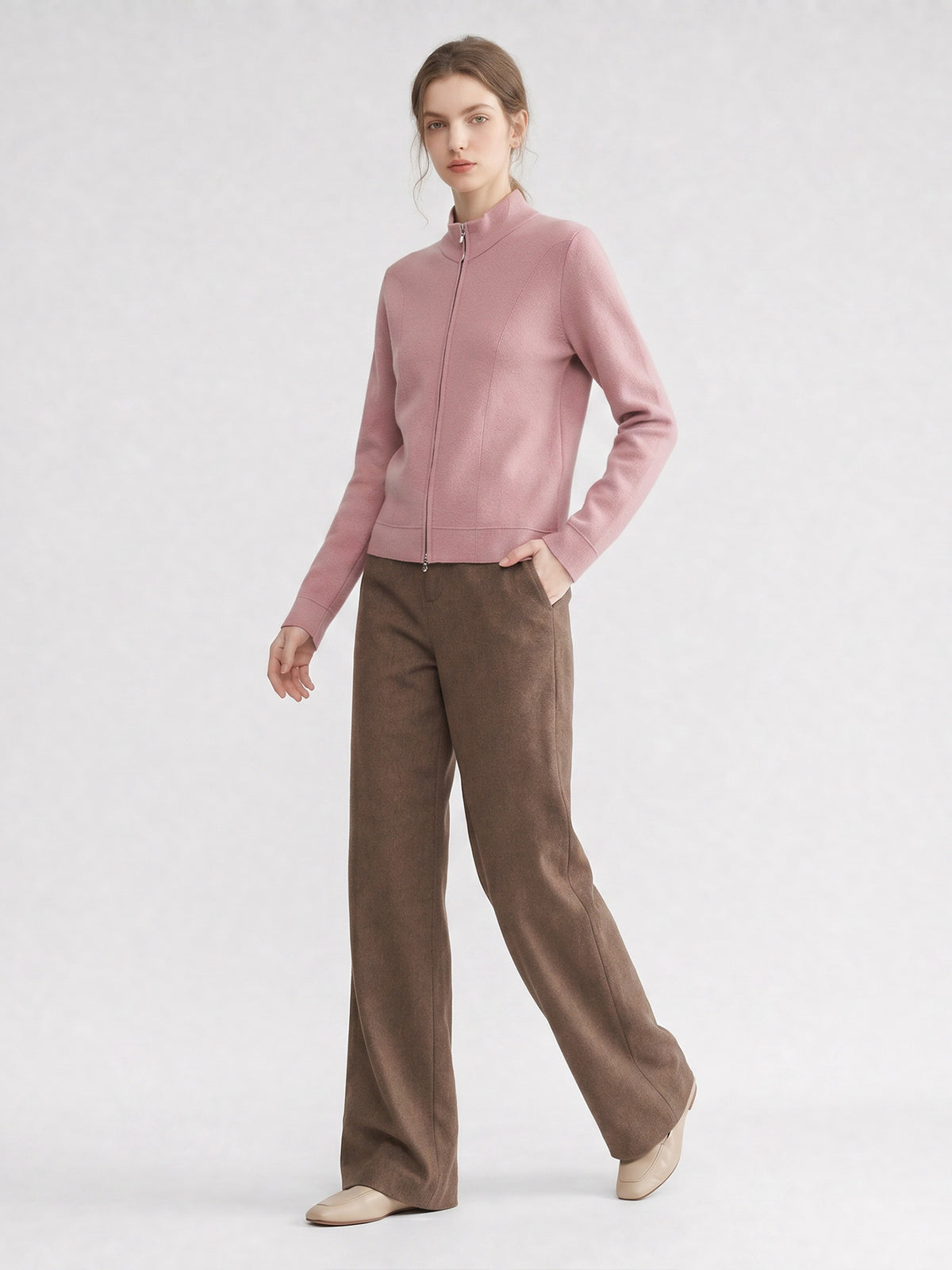 Women’s pink knit cardigan with stand-up collar and front zipper