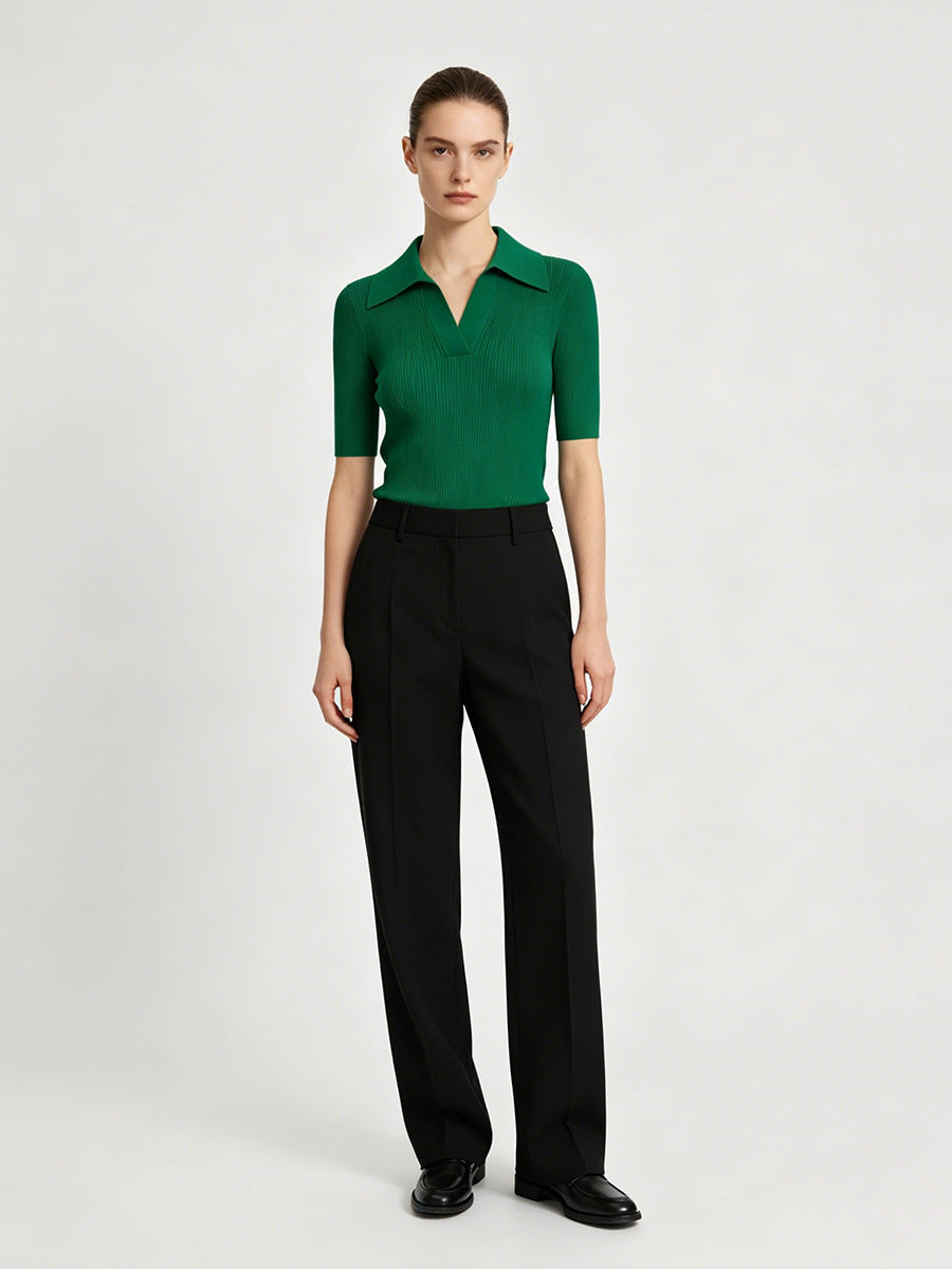 Women's green ribbed knit polo top with open collar and short sleeves