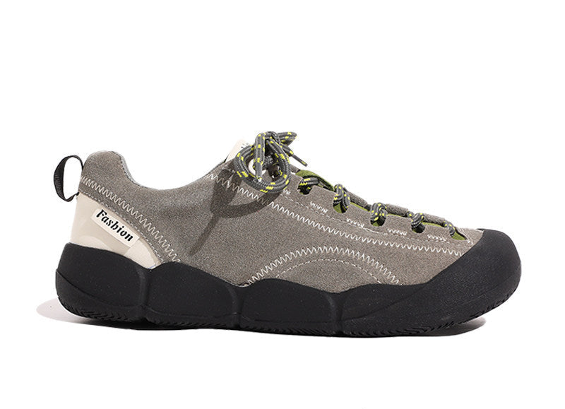 Gray platform hiking shoes with green lace-up front and black thick sole
