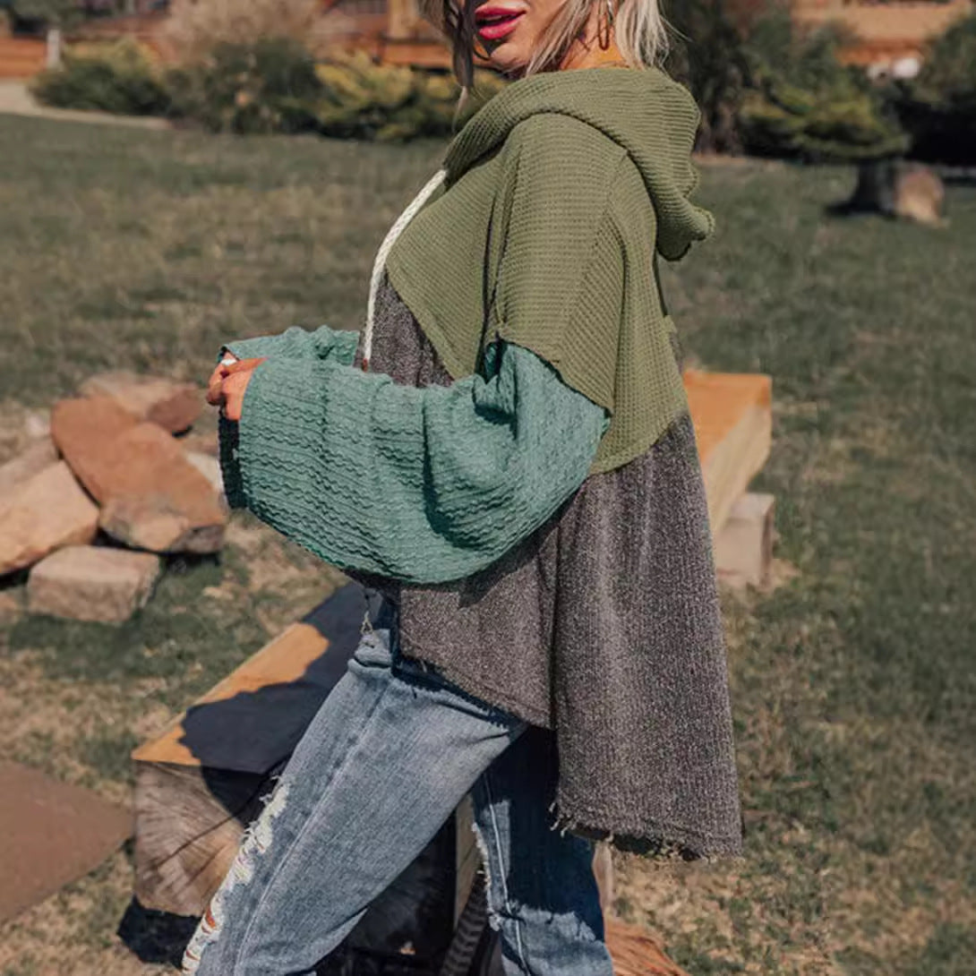 Women’s hooded long-sleeve tunic with drawstring hood, olive and teal sleeves over dark panel