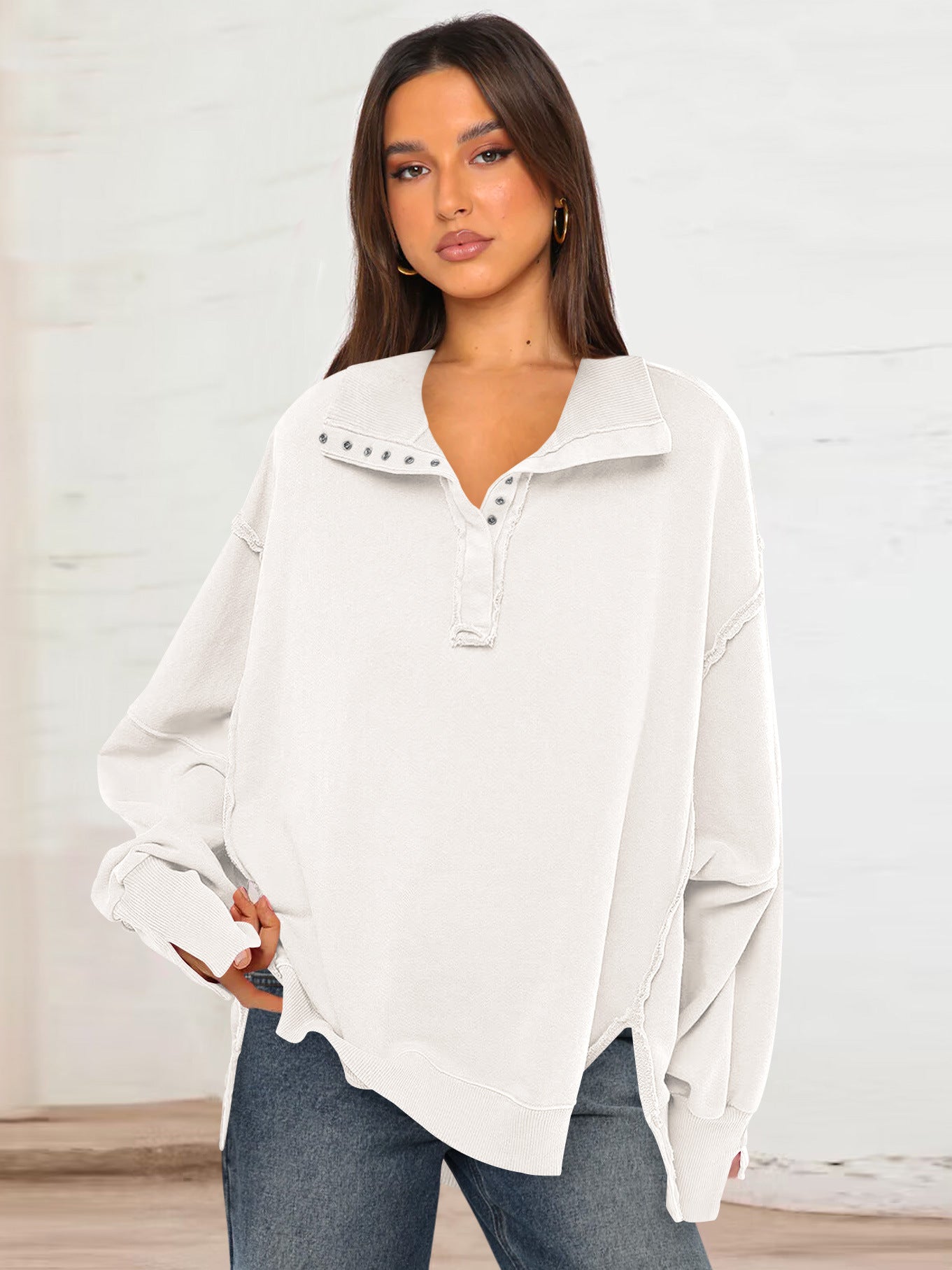 Women's white polo-collar sweatshirt top with button placket and lantern sleeves