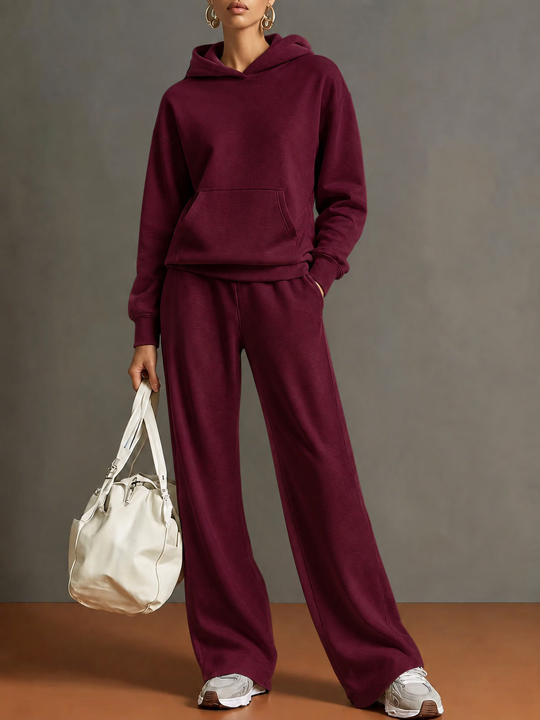 Women's hooded sweatshirt and wide-leg pants set, wine red, loose fit.