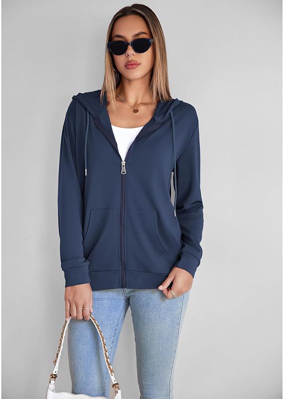 Navy zip-up hoodie with hood drawstrings and kangaroo pocket