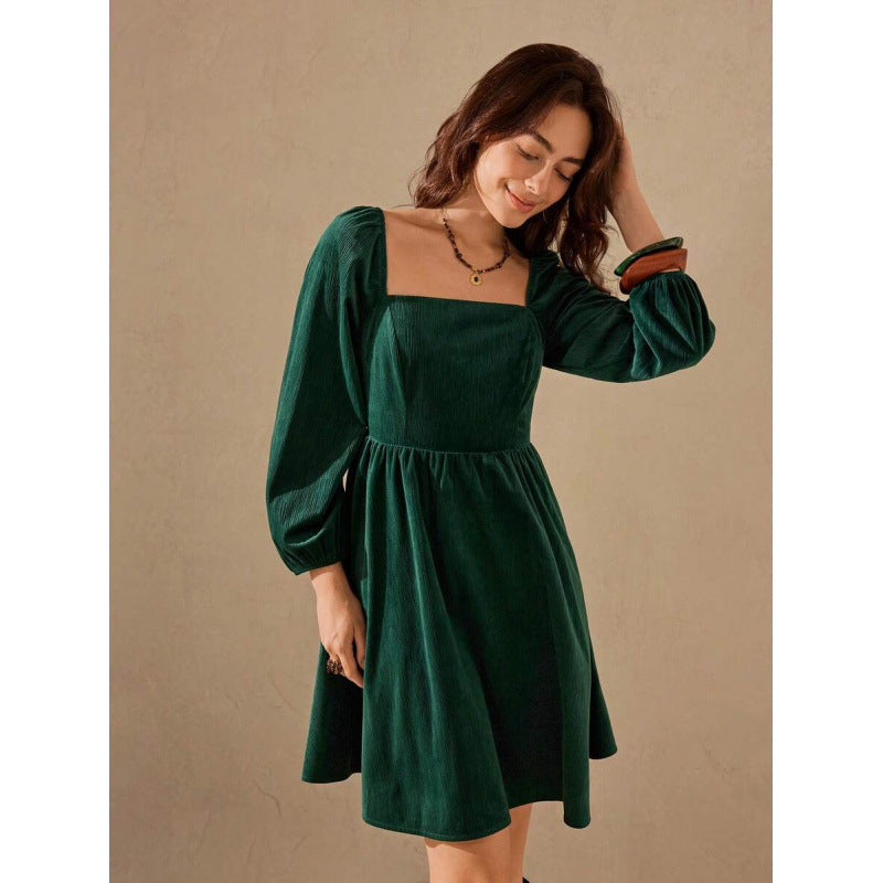 Dark green corduroy square-neck mini dress with puffed lantern sleeves
