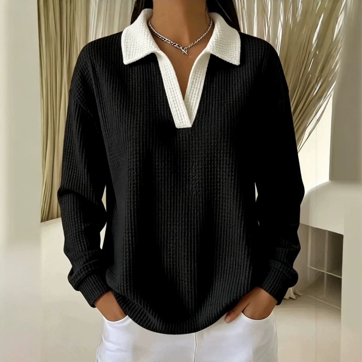 Black waffle-knit V-neck long-sleeve polo shirt with white contrast collar and placket