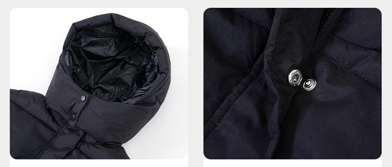 Black hooded puffer jacket close-up: quilted hood lining and snap buttons