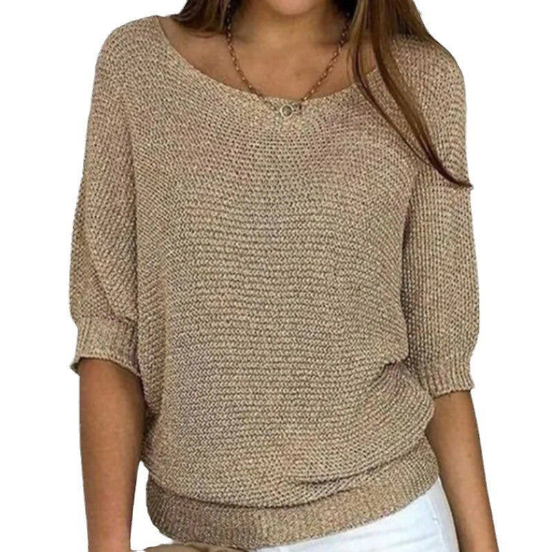 Khaki knit top with round neck and three-quarter sleeves, ribbed hem and cuffs