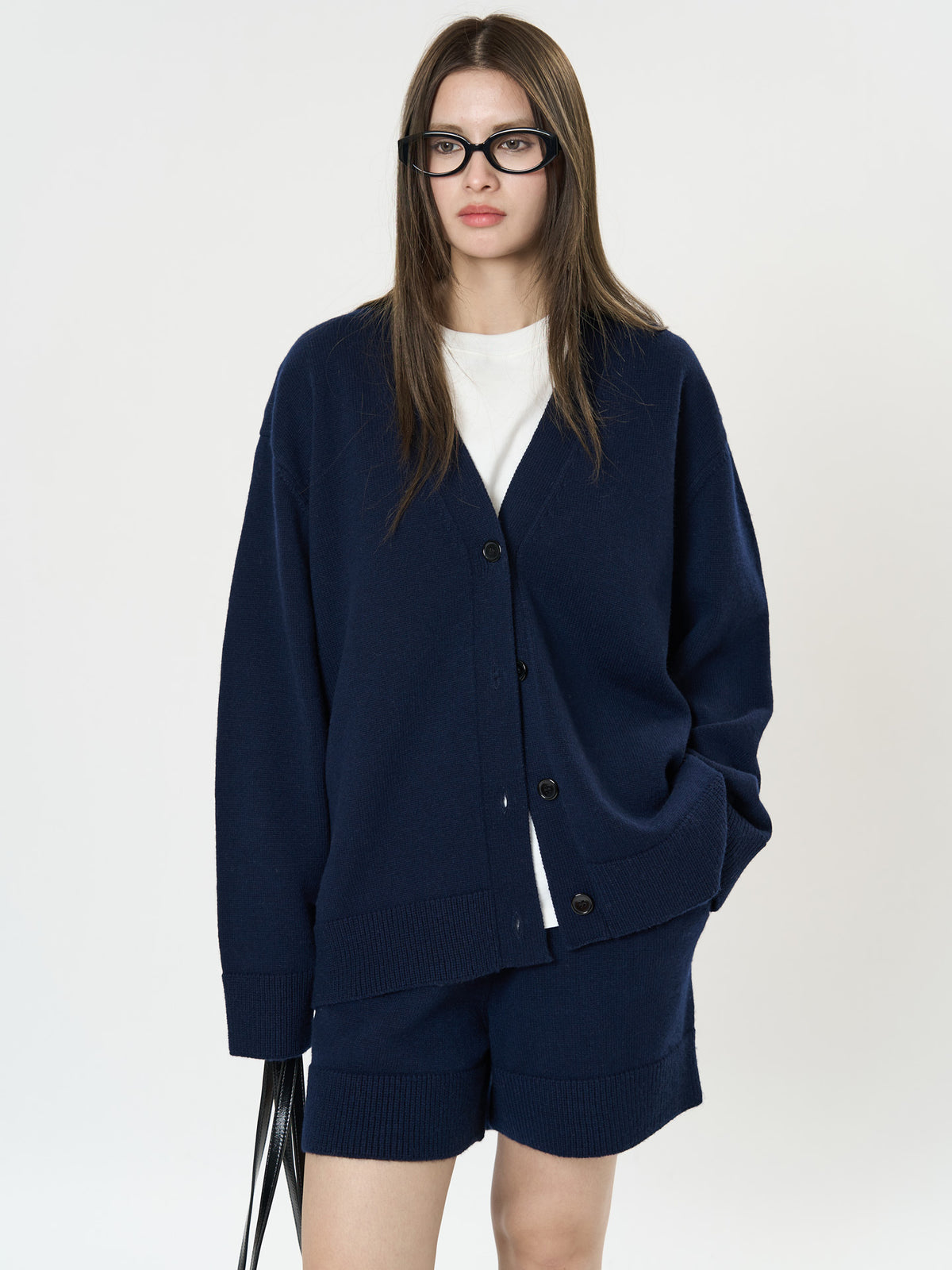Women's wool knit V-neck cardigan, navy button-front with ribbed cuffs