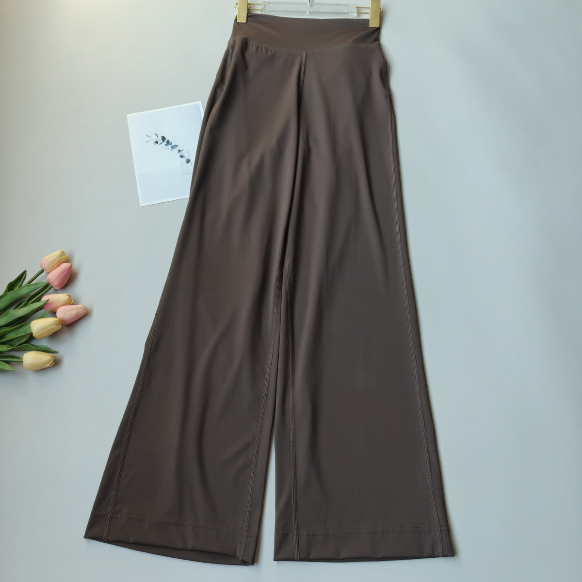 Brown high-waisted wide-leg yoga pants, full-length relaxed drape