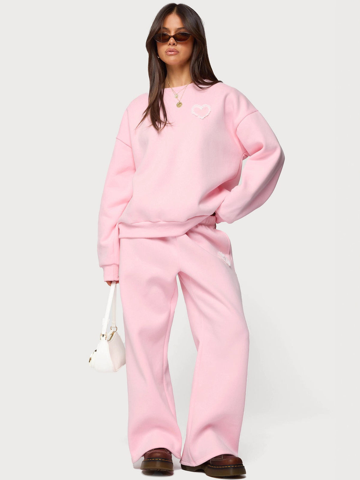 Pink heart-logo hoodie and wide-leg sweatpants two-piece set