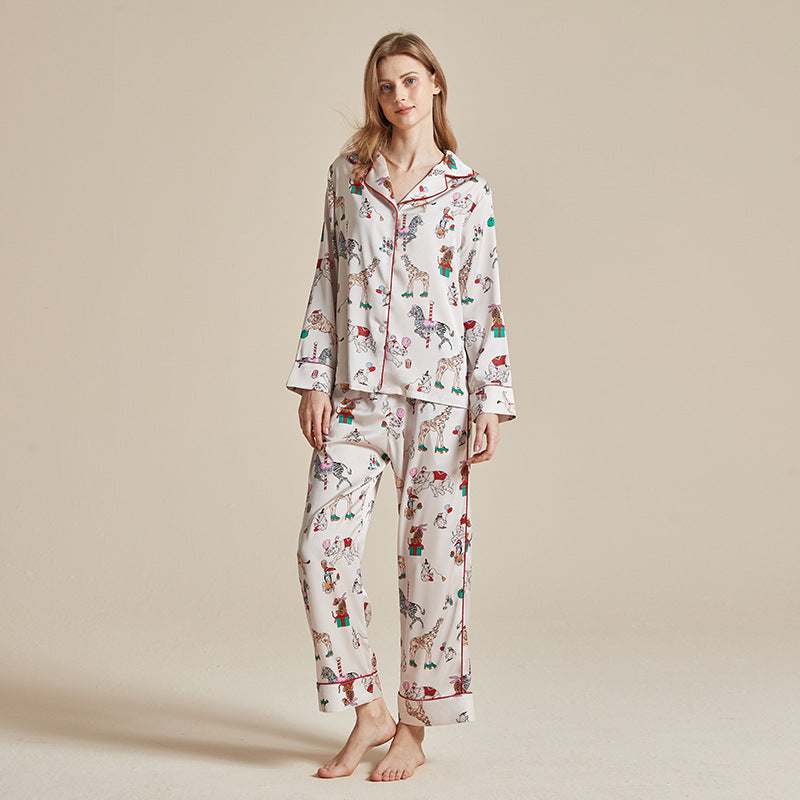 Women’s long-sleeve printed pajama set with white base and colorful animal motifs