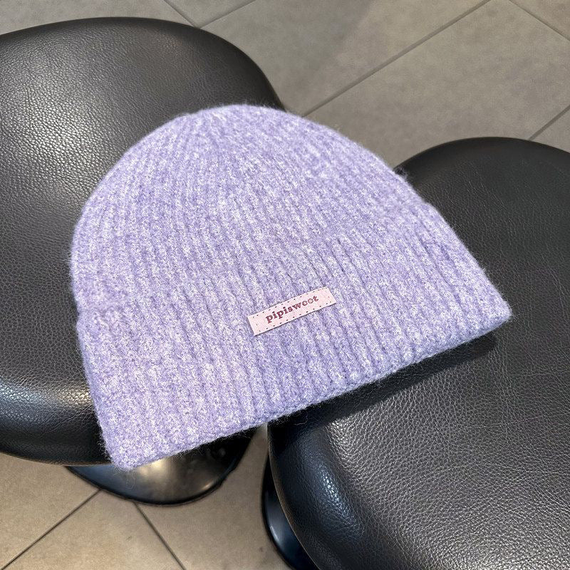 Light purple ribbed knit wool beanie hat with folded cuff