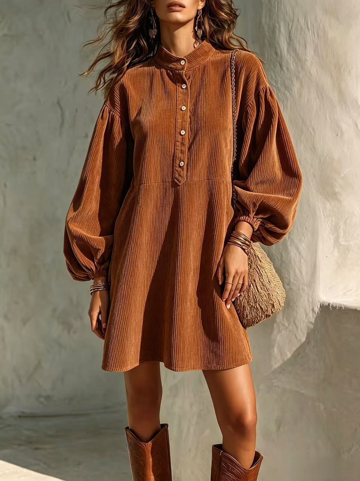 Brown corduroy dress with stand-up collar, button-front, and lantern sleeves