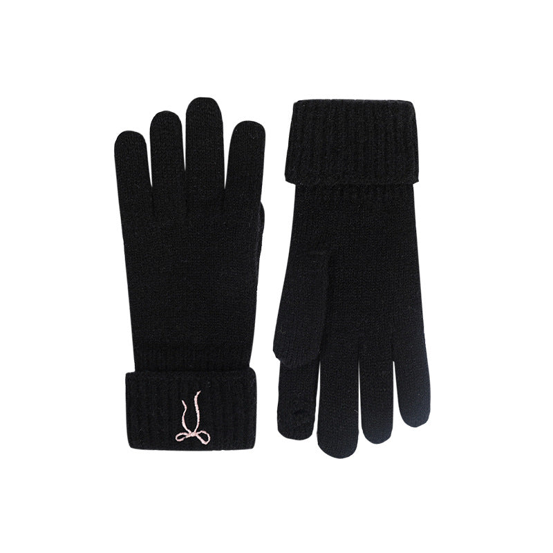 Black knitted gloves shown front and back, with ribbed cuffs and touch-screen fingertips.