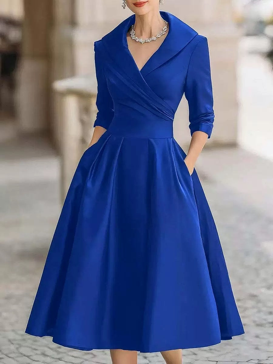 Women’s waist-cinching dress, royal blue, long sleeves, V-neck, A-line skirt.