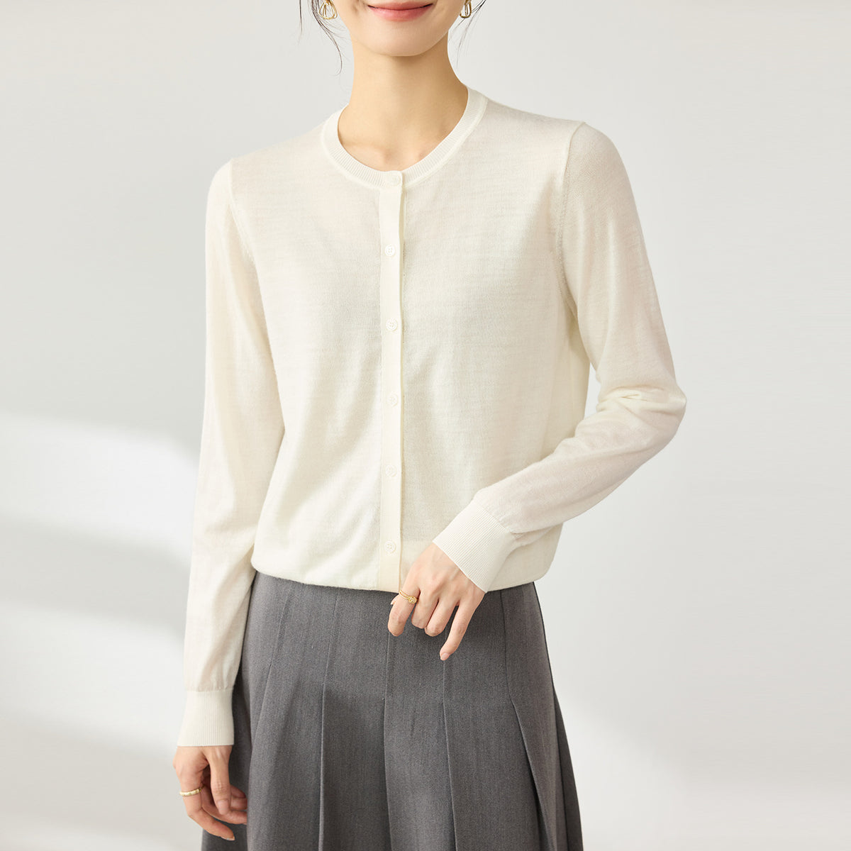 Women's cream wool cardigan, round neck button-front, long sleeves