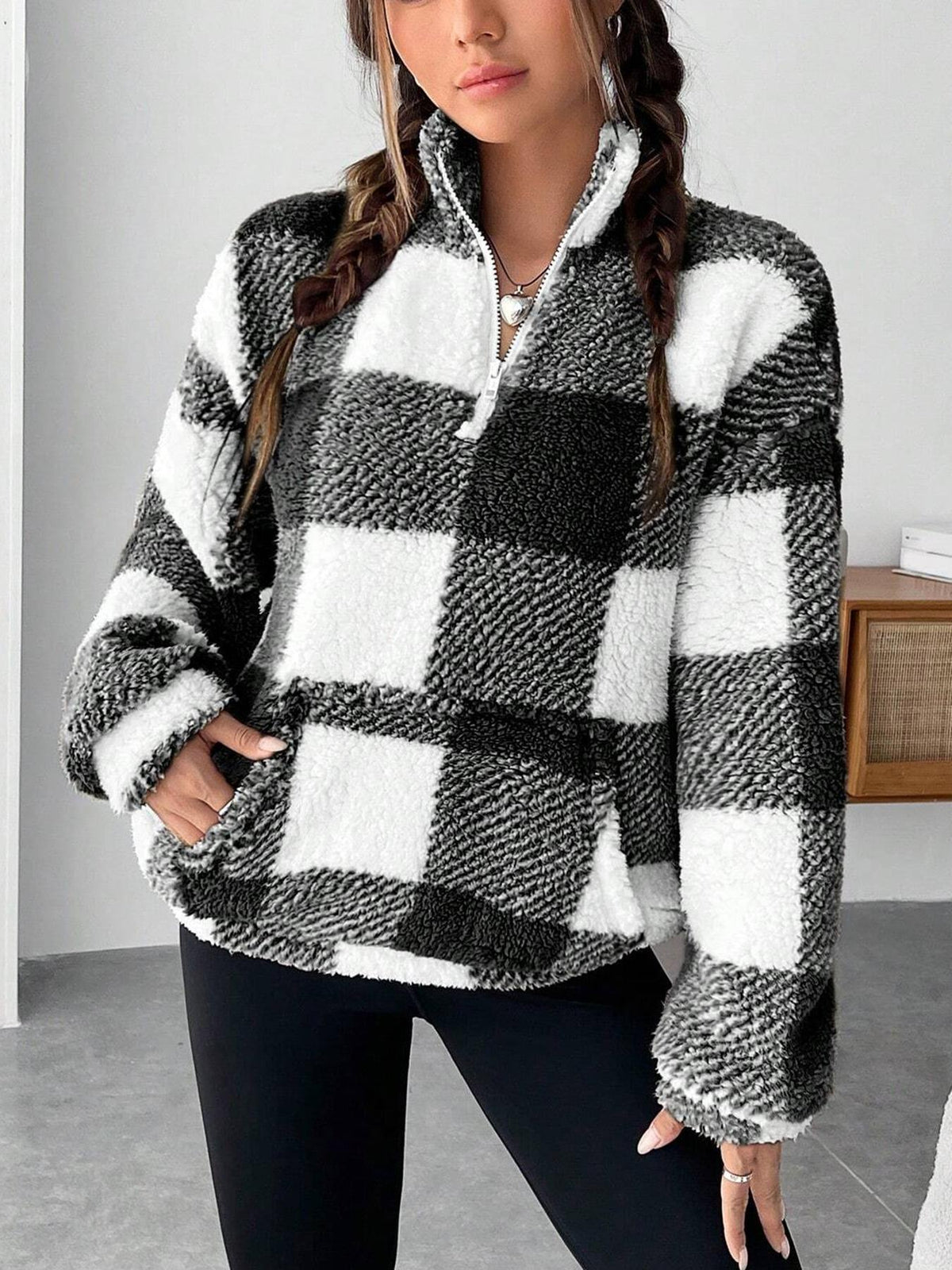 Black and white plaid fuzzy quarter-zip sweatshirt with half-open collar for women