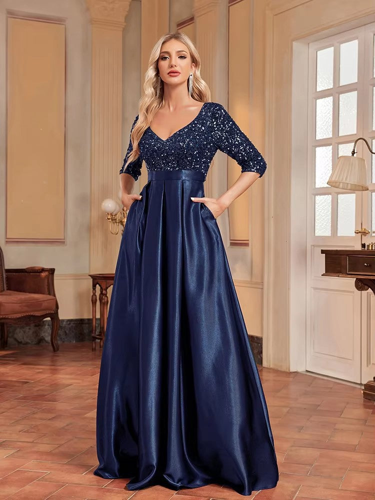 Navy V-neck sequin evening dress with satin flared skirt, fitted waist