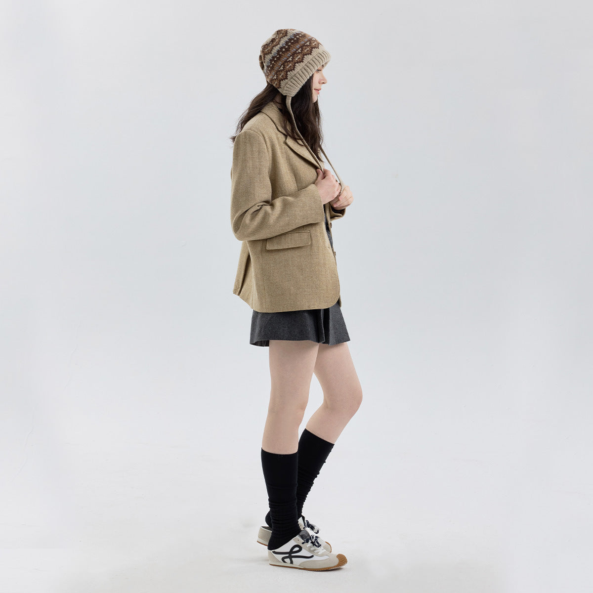 Fair Isle knit beanie with ribbed cuff and long tie strap, multicolor pattern