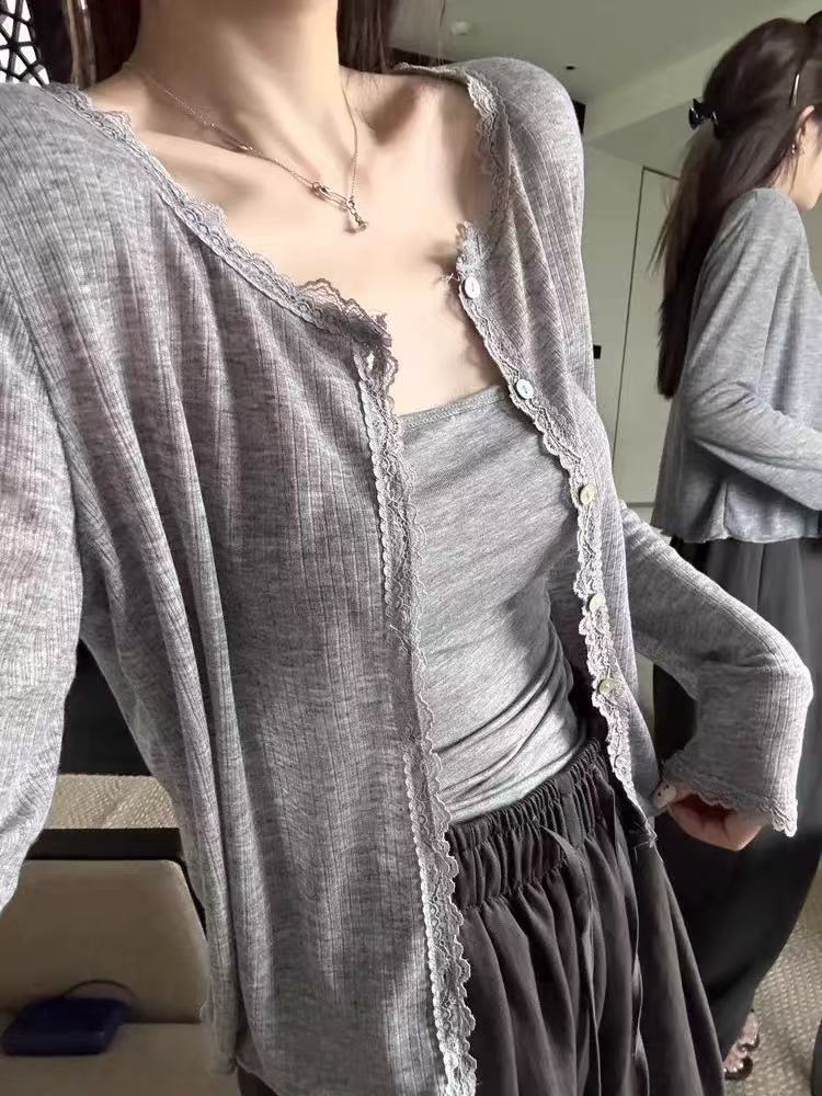 Women\u2019s sheer gray cardigan with scalloped lace trim and button-front detail