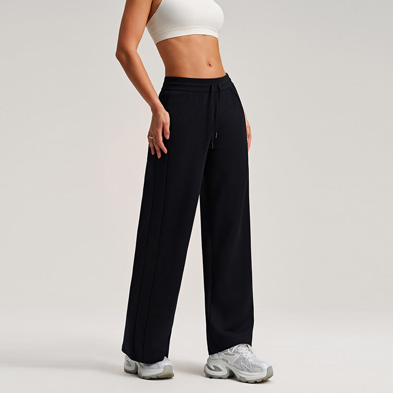 Black high-waisted wide-leg drawstring sweatpants with elastic waistband, front view