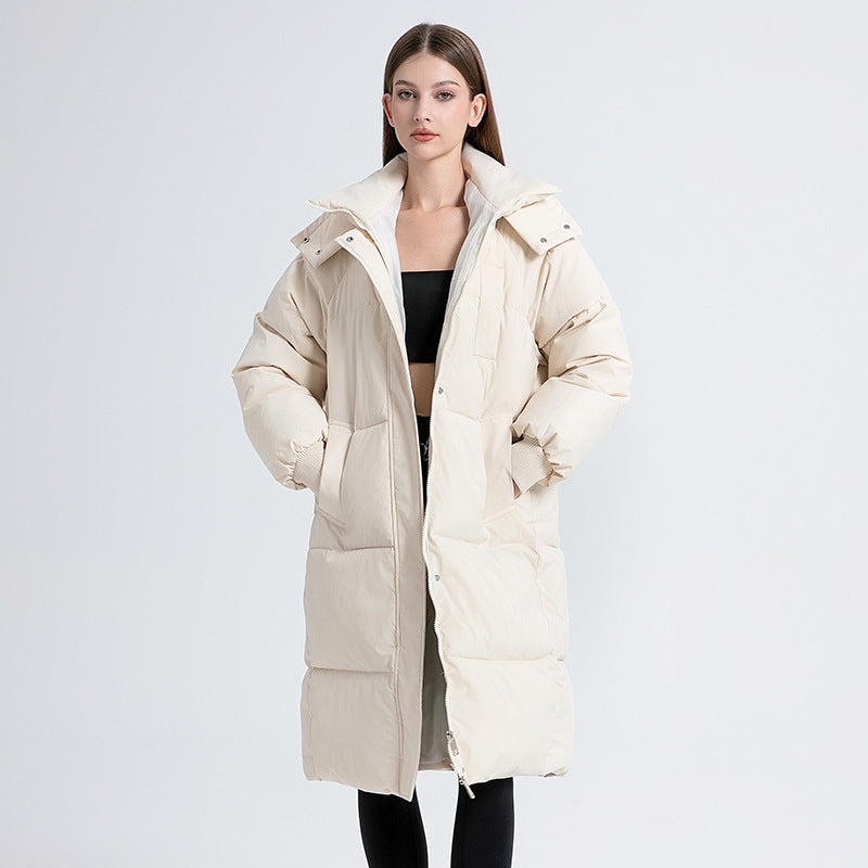 Women’s long hooded puffer cotton coat in off-white, zip front, thick quilted panels.