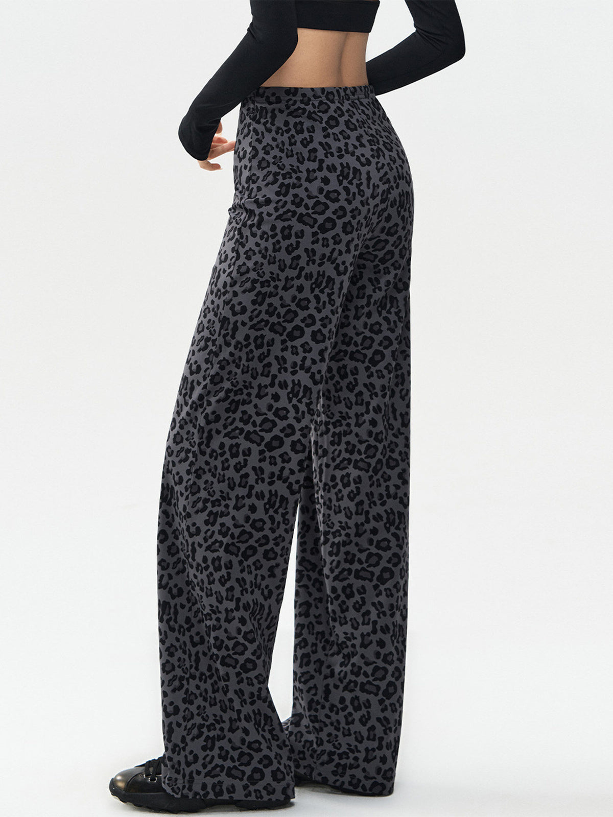 Leopard-print wide-leg leggings, gray with black spots; relaxed fit full length.