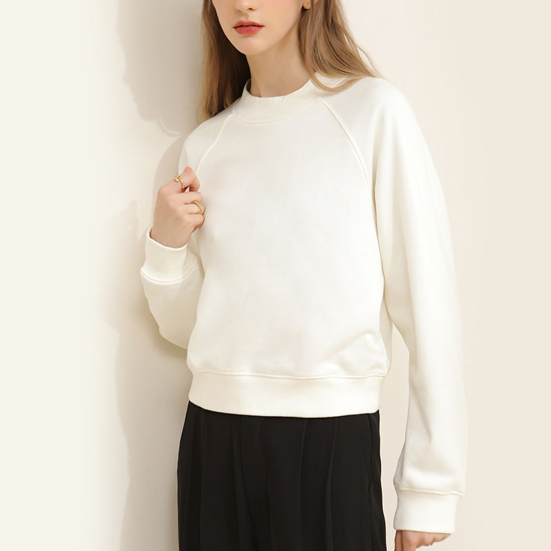 Off-white crewneck sweatshirt, long raglan sleeves, relaxed fit