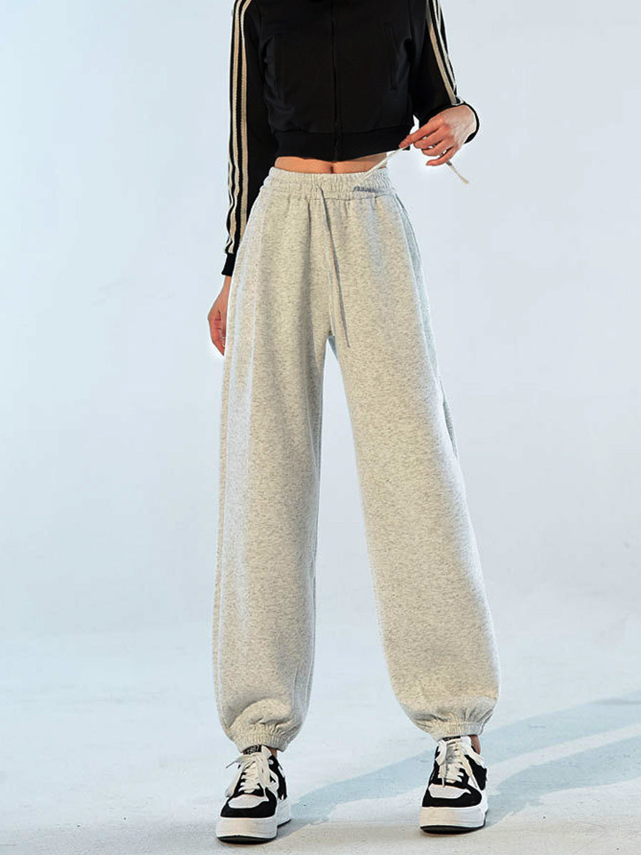 Light gray speckled high-waist jogger sweatpants with drawstring and cuffed hem.
