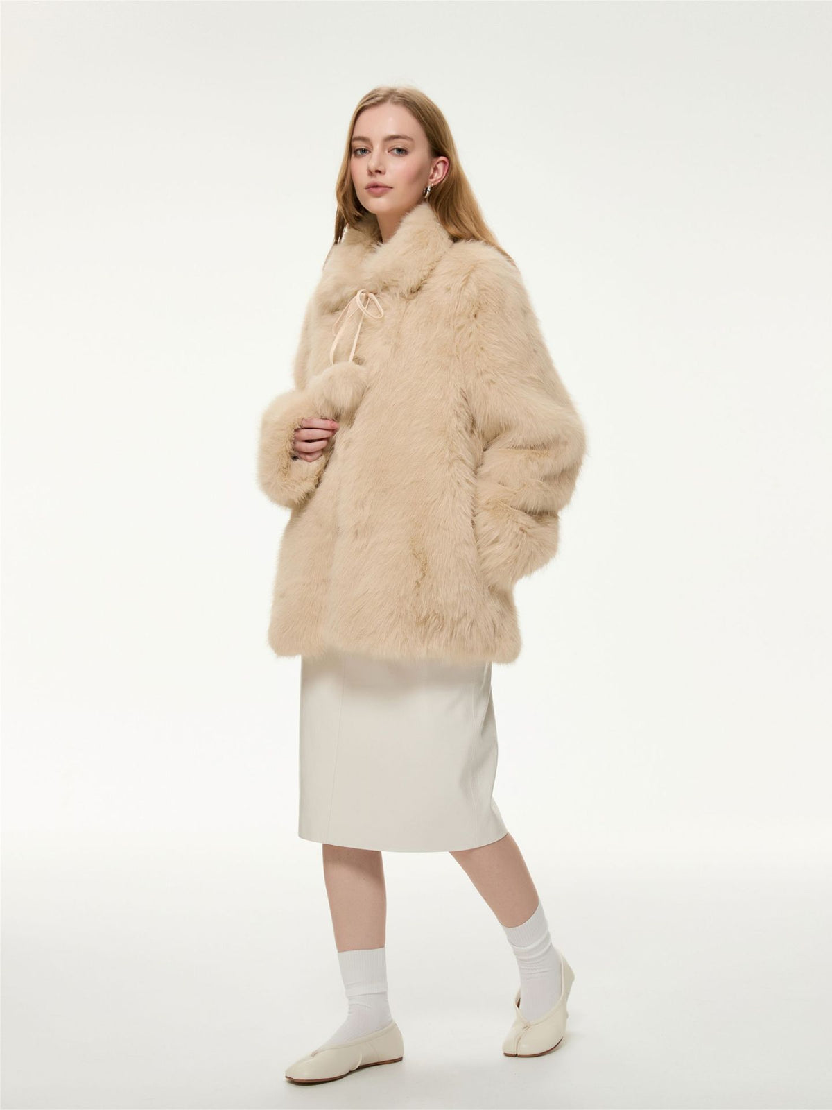 Cream faux fur coat with drawstring hood and pom-pom, relaxed fit