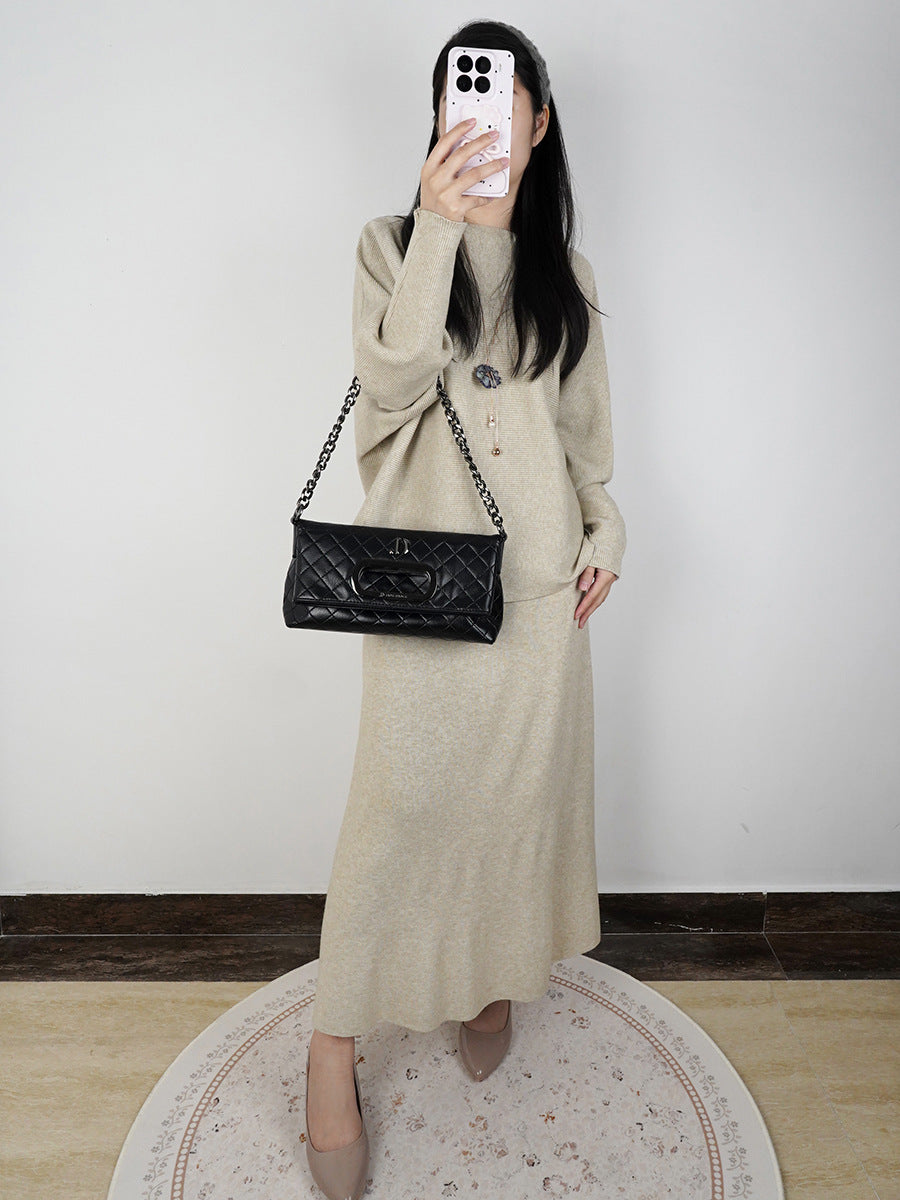 Women’s light beige knit maxi skirt with elastic waist and relaxed drape