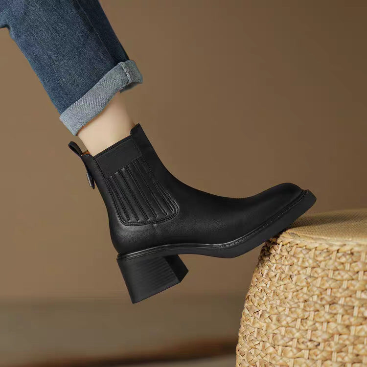 Women's black short chelsea boots with square toe, elastic gore, chunky mid heel.