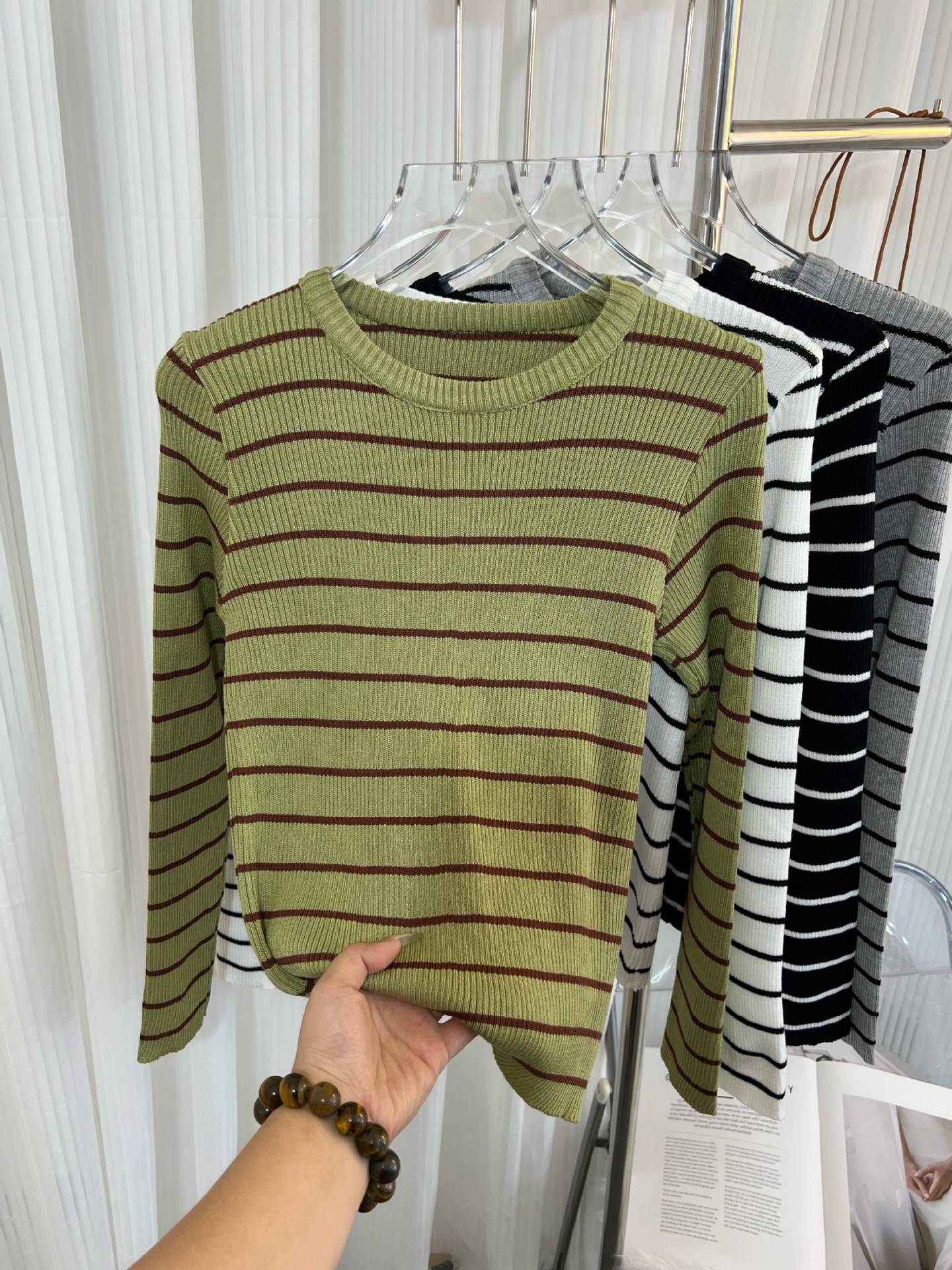 Women’s striped long-sleeve crewneck top, olive green with red horizontal stripes