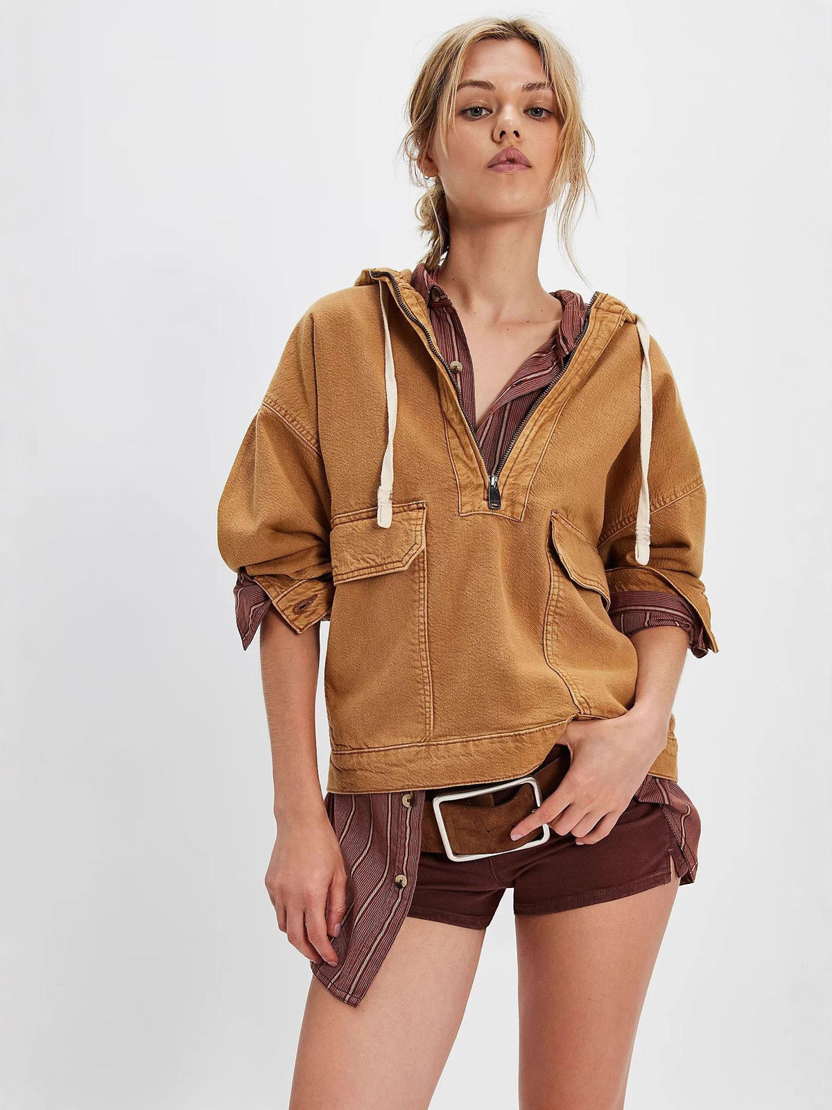 Brown hooded denim jacket with half-zip, drawstring cords, and front patch pockets