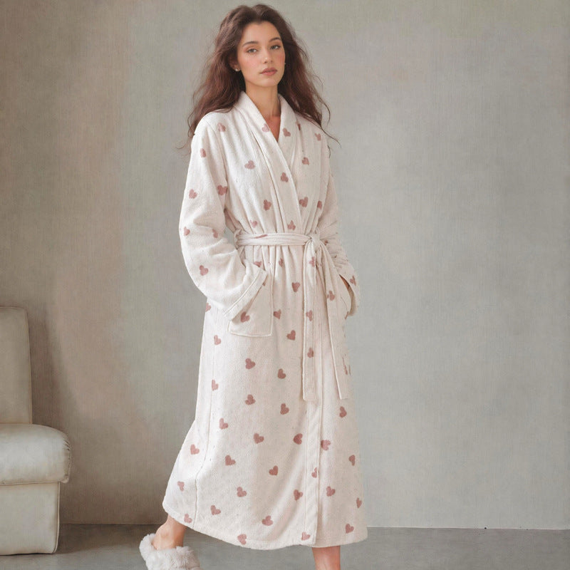 Women’s long flannel bathrobe in white with red heart print, tie belt and pockets