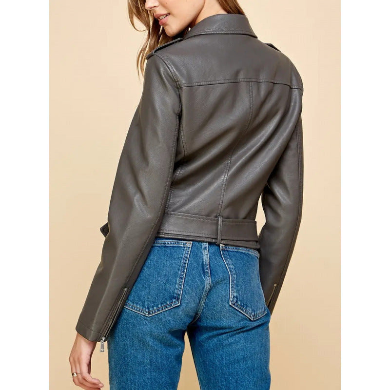 Women's short PU leather jacket in dark gray, back view with shoulder seam details