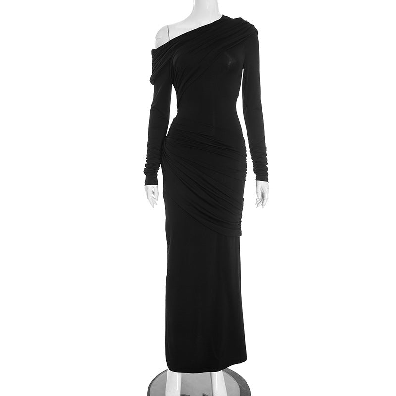 Black off-shoulder pleated long dress on mannequin with long sleeves