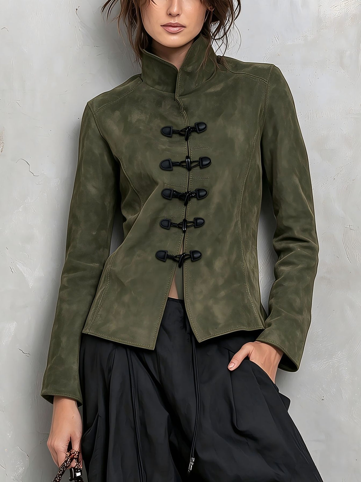 Military green short jacket with a stand collar and black toggle fasteners