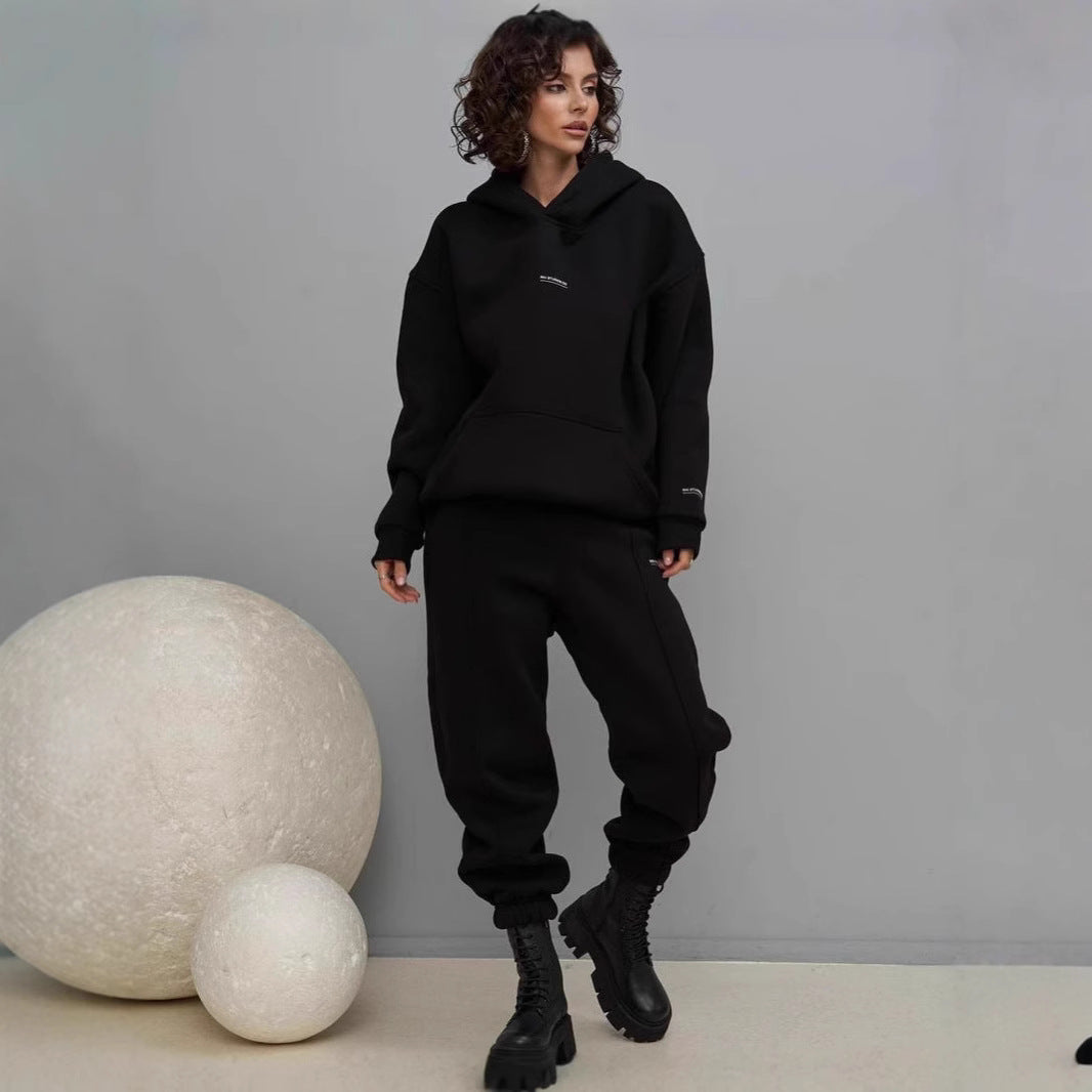 Black hooded sweatshirt and matching jogger pants set with drawstring hood